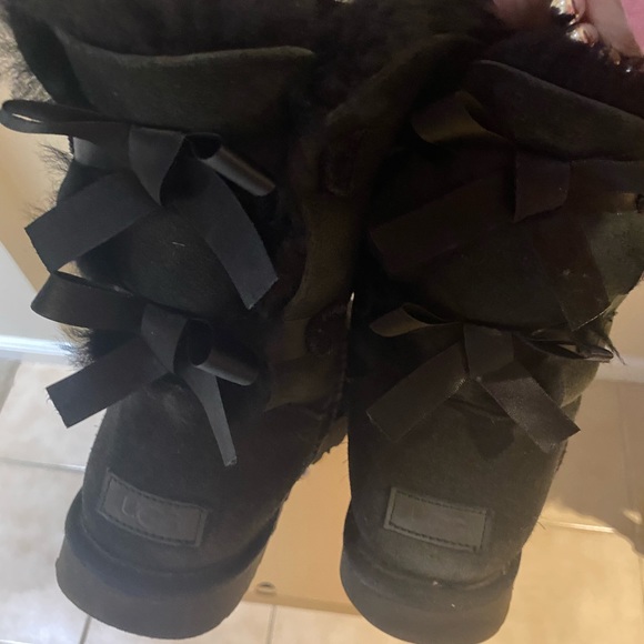 Uggs in black with two bows, size 10. Used. - Picture 2 of 3